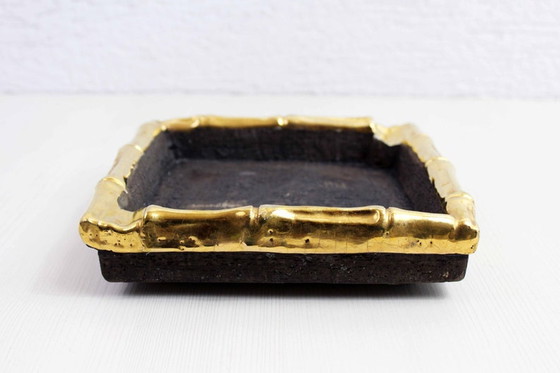 Image 1 of Very elegant ashtray which will quickly find its place on a side table or outdoor furniture.  Very well made, it is made of raw 