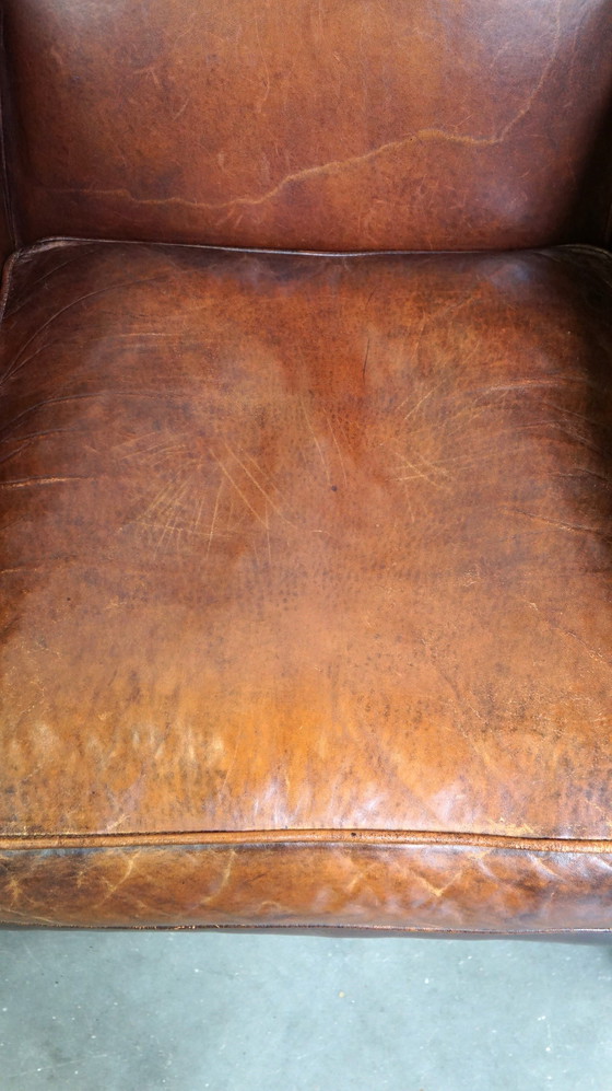 Image 1 of Fauteuil à oreilles en peau de mouton couleur cognac de style anglais