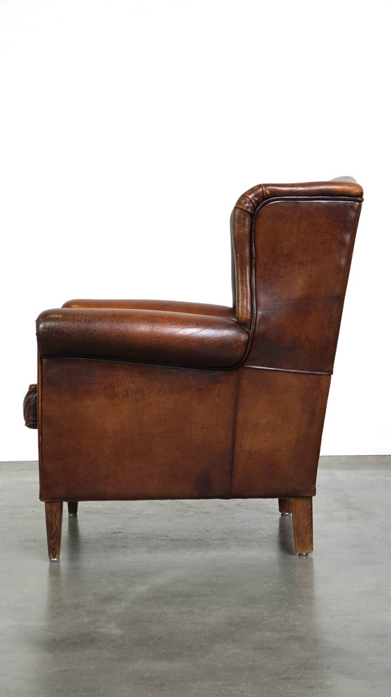 Image 1 of Fauteuil à oreilles en peau de mouton couleur cognac de style anglais