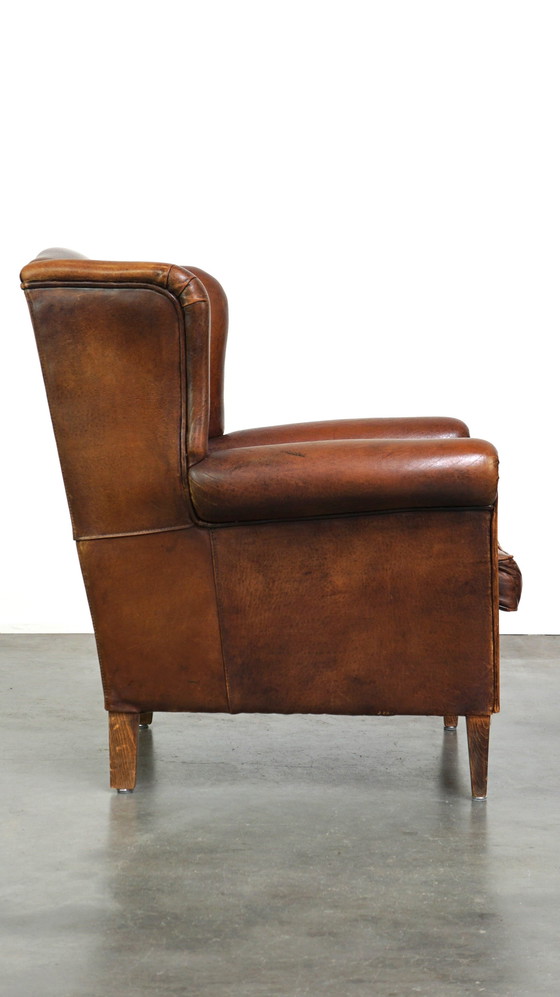 Image 1 of Fauteuil à oreilles en peau de mouton couleur cognac de style anglais