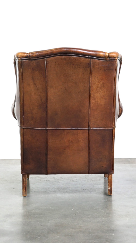 Image 1 of Fauteuil à oreilles en peau de mouton couleur cognac de style anglais