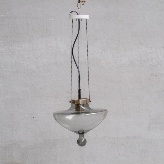 Image 1 of Pair of vintage pendant lamp in smoked glass and brass for Raak, Netherlands 1970