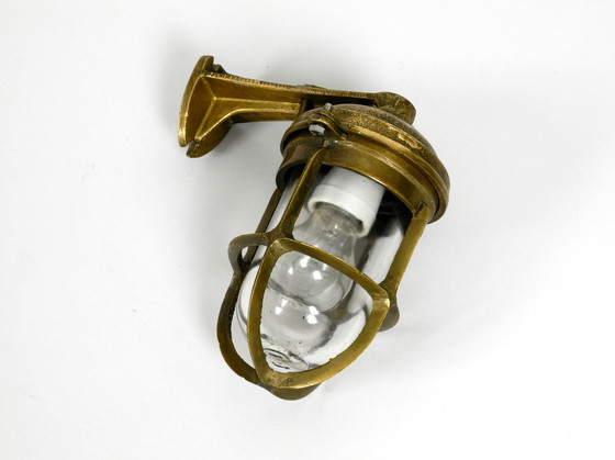 Image 1 of Heavy 1950s maritime ship wall lamp made of cast brass and with glass shade