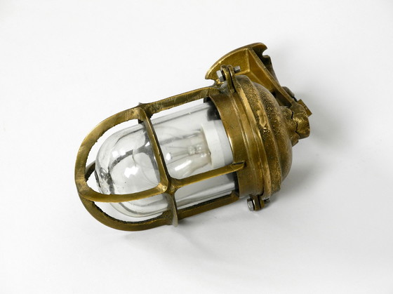 Image 1 of Heavy 1950s maritime ship wall lamp made of cast brass and with glass shade