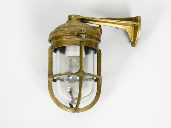 Image 1 of Heavy 1950s maritime ship wall lamp made of cast brass and with glass shade