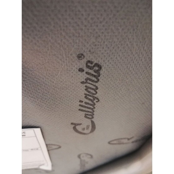 Image 1 of Poltrona vintage Calligaris in legno chiaro e pelle nera, Italia