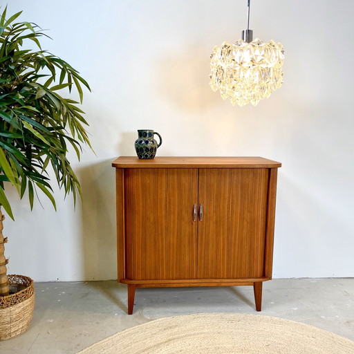 Teak Finished Rolling Door Cabinet In Scandinavian Style