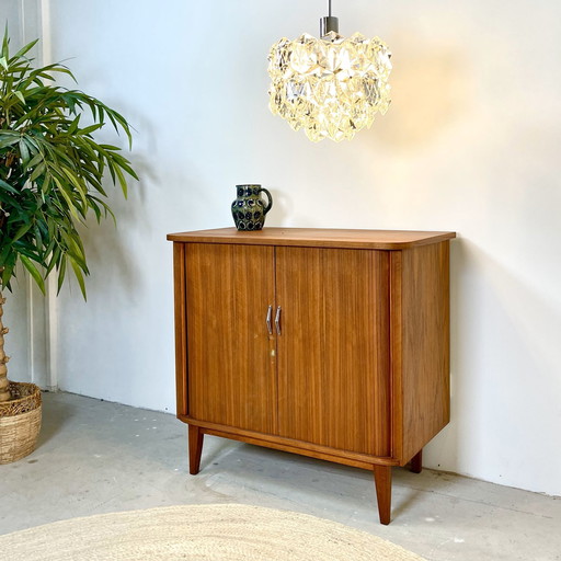 Teak Finished Rolling Door Cabinet In Scandinavian Style