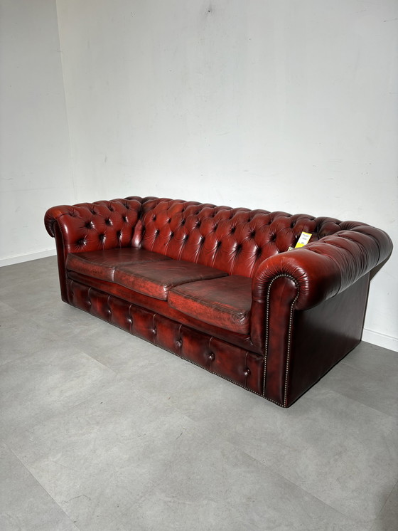 Image 1 of Chesterfield red leather sofa