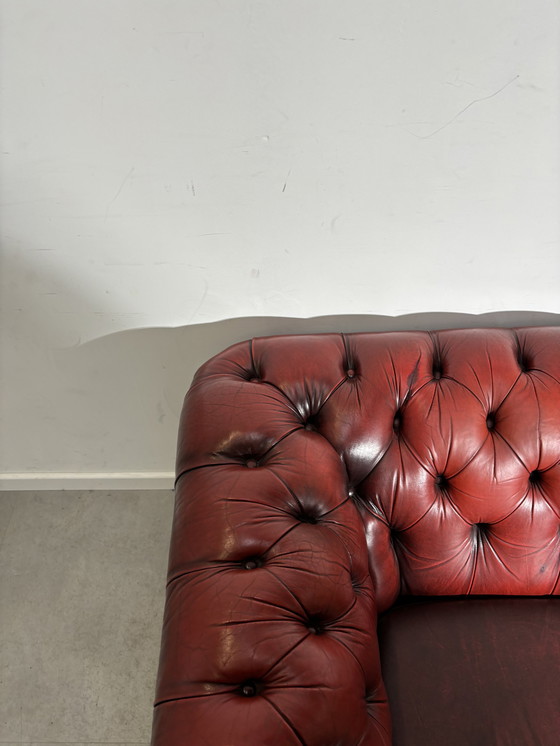 Image 1 of Chesterfield red leather sofa