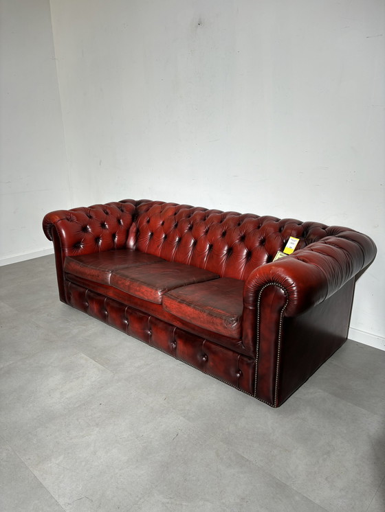 Image 1 of Chesterfield red leather sofa