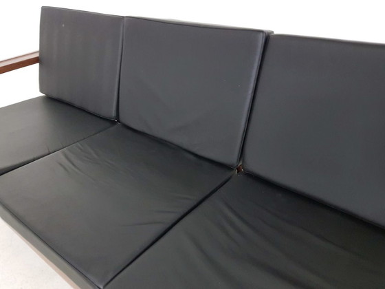 Image 1 of Rosewood sofa with black vinyl upholstery