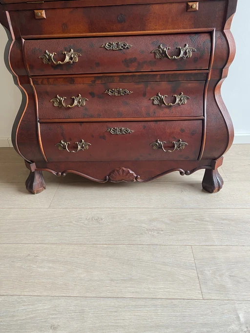 Belly secretaire with many compartments