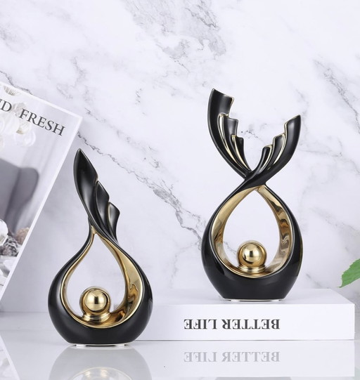 2 Black And Gold Ceramic Decorative Sculptures