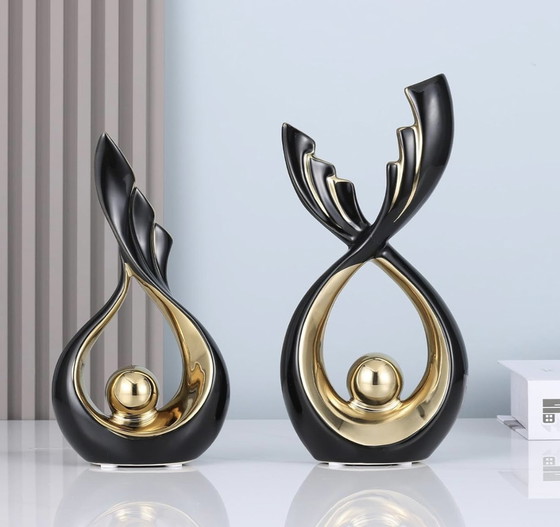 Image 1 of 2 Black And Gold Ceramic Decorative Sculptures