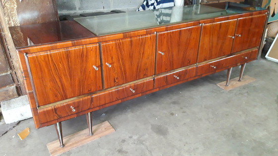 Image 1 of Vintage Rio rosewood sideboard, backlit.