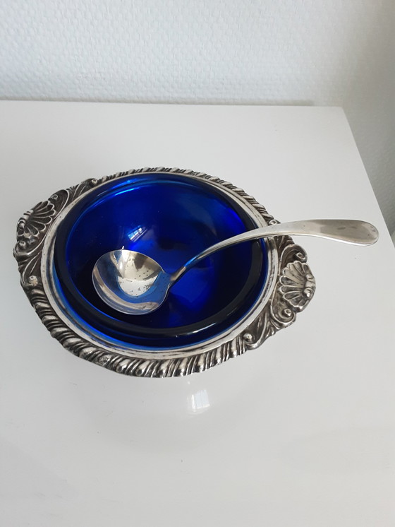 Image 1 of A flat (blue) caviar bowl