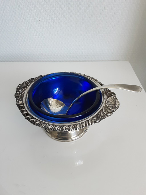 A flat (blue) caviar bowl