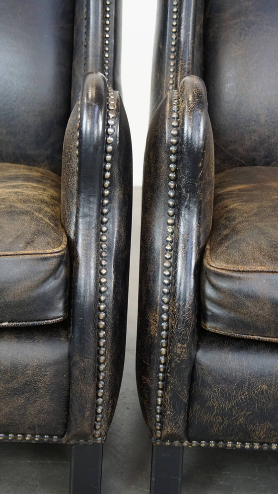 Image 1 of 2 X Black Beef Leather Armchair With A High Back And With Decorative Nails