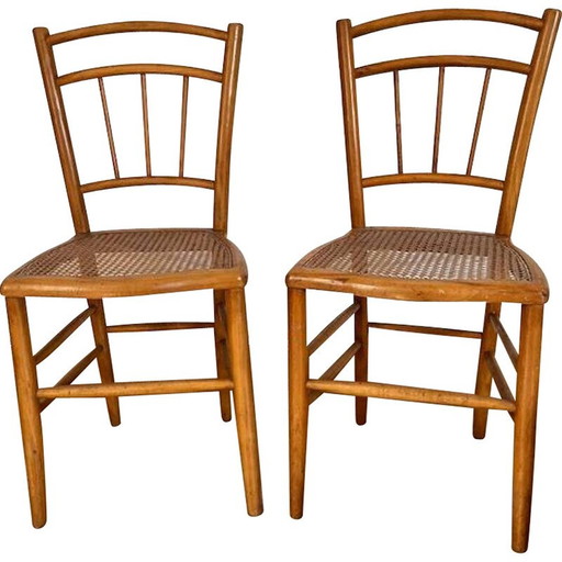 Pair of vintage wooden cane chairs