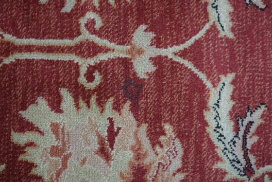 Image 1 of Tapis en laine de mouton aux tons rouges et jaunes, 325 x 170 cm