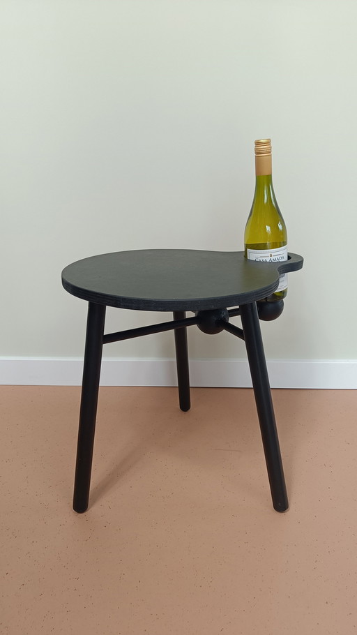 Design side table with wine bottle holder