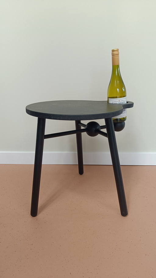 Design side table with wine bottle holder