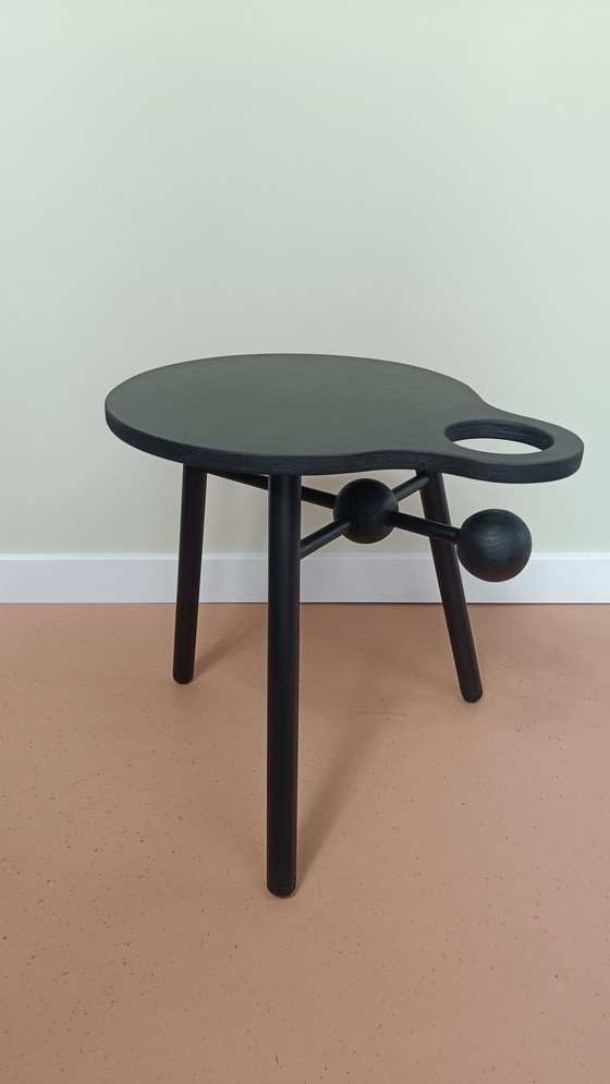 Image 1 of Mesa auxiliar de diseño con portabotellas de vino