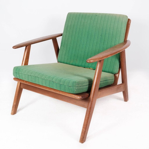 Vintage Danish armchair in teak and with green upholstery, 1960s