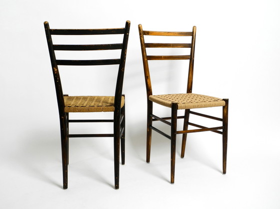 Image 1 of A pair of beautiful Mid Century Italian wooden dining chairs with wicker cord seats