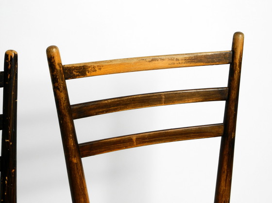 Image 1 of A pair of beautiful Mid Century Italian wooden dining chairs with wicker cord seats