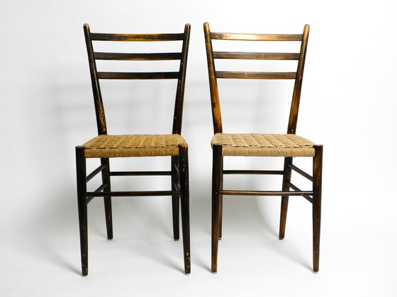 Image 1 of A pair of beautiful Mid Century Italian wooden dining chairs with wicker cord seats