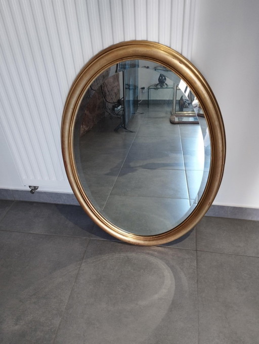 Large And Elegant Oval Golden Mirror With Beveled Glass