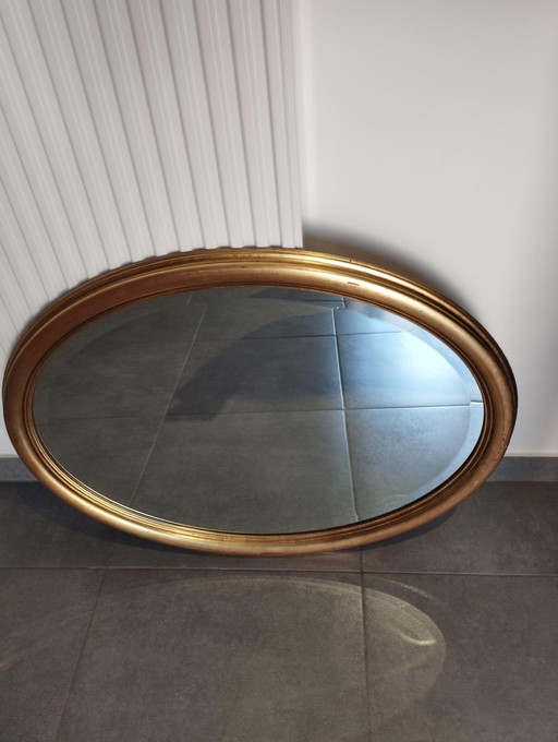 Large And Elegant Oval Golden Mirror With Beveled Glass