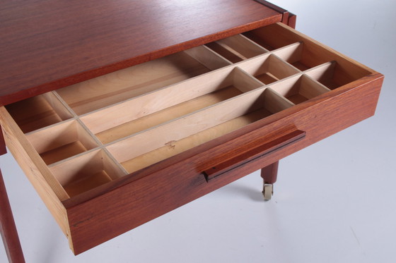 Image 1 of Danish teak side table with drawers on wheels