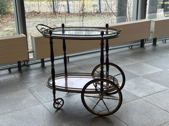 Image 1 of Neoclassical Oval Scroll Table Of Brass And Mahogany With Double Removable Trays. French Work Of The Maison Baguès. Circa 1940.