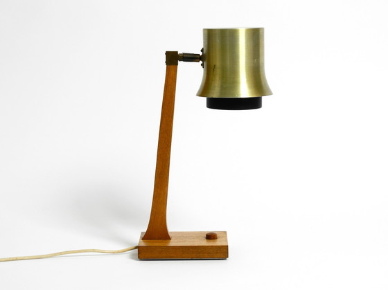 Image 1 of Mid Century table lamp made of teak, with aluminum shade | Made in Denmark