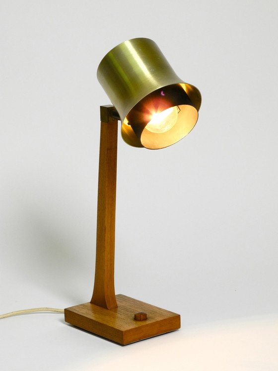 Image 1 of Mid Century table lamp made of teak, with aluminum shade | Made in Denmark