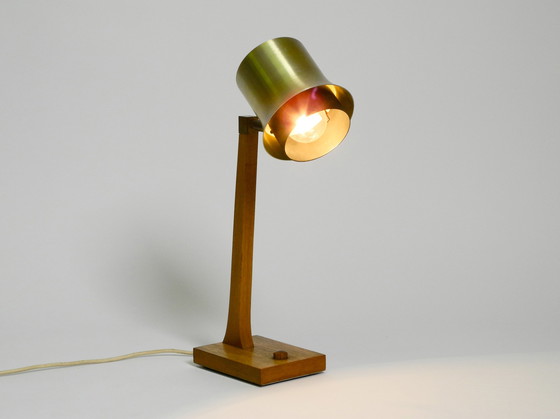 Image 1 of Mid Century table lamp made of teak, with aluminum shade | Made in Denmark