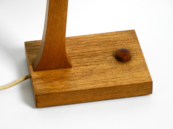 Image 1 of Mid Century table lamp made of teak, with aluminum shade | Made in Denmark