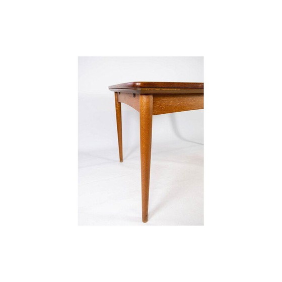 Image 1 of Vintage teak table with extensions and oak legs Denmark 1960s