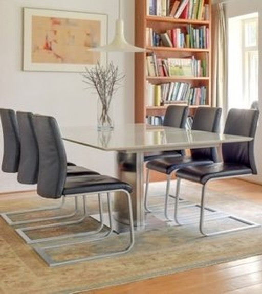 1 Dreanert Dining Table And 6 Leather Chairs By Musterring