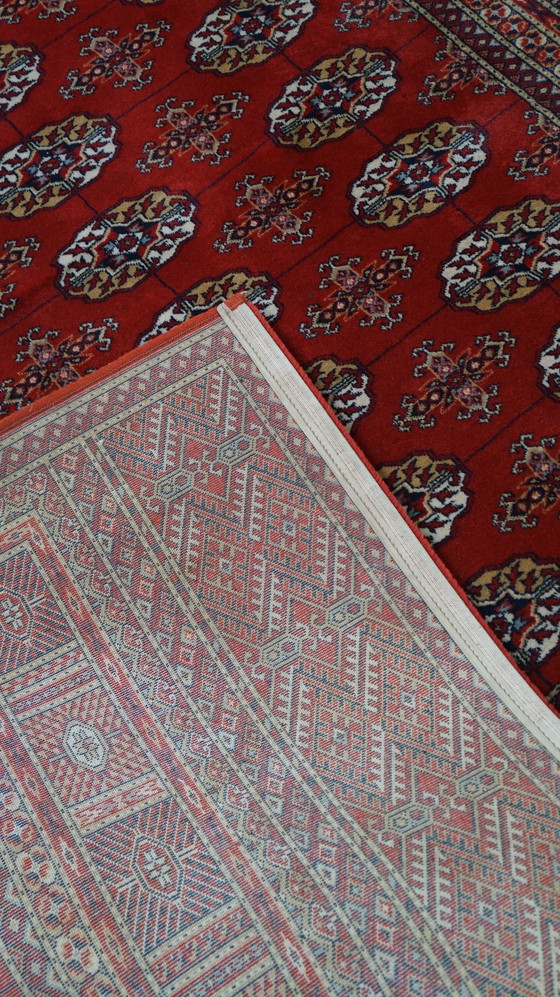 Image 1 of Oriental rug in warm shades of red, 240 x 170 cm