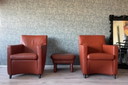 2x poltrona in pelle Leolux Dolcinea + poggiapiedi