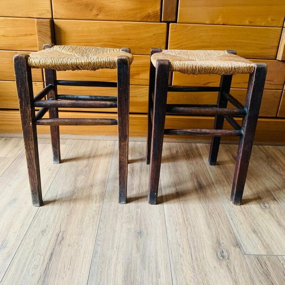 Image 1 of Pair of vintage wood and straw stools