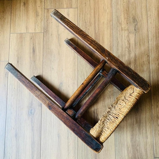 Image 1 of Pair of vintage wood and straw stools