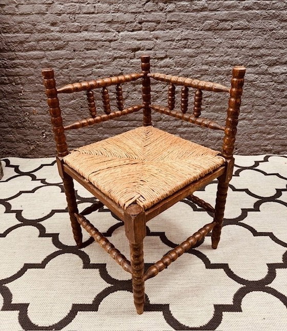 Image 1 of Vintage Brutalist Bobbin Oak Corner Chair With Braided Piping Seat