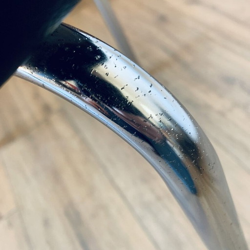 Vintage armchair in black skai, 1960