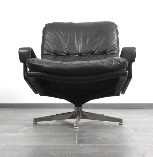 King Chair in black leather by André Vandenbeuck