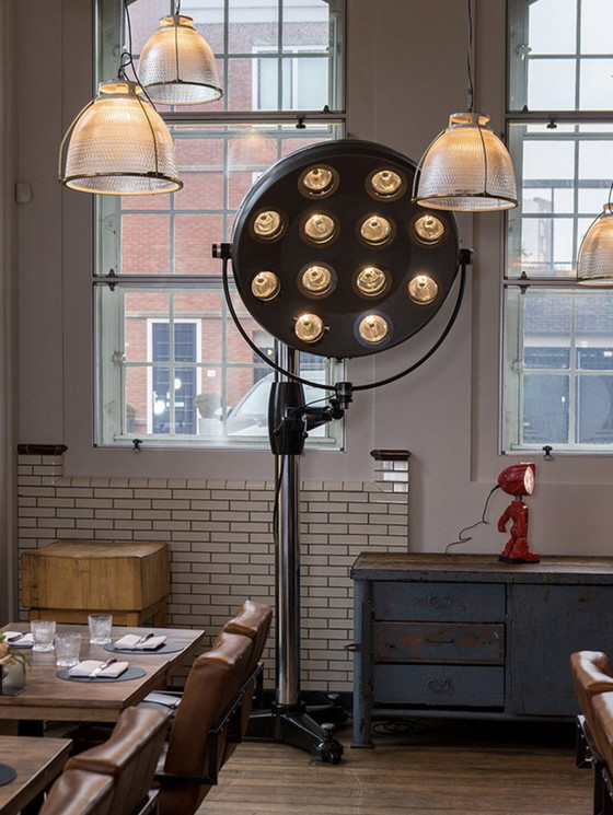 Image 1 of Industrial Re-designs Operating floor lamp on a heavy tripod